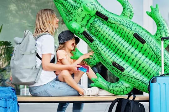 A woman and a child before leaving for vacation